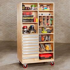 a garage storage cabinet with lots of tools