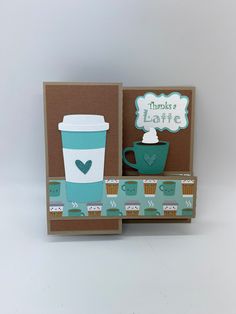 a card with a cup of coffee on it and an envelope that says, i love you