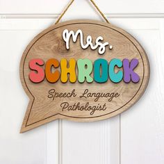 a wooden sign that says mrs schrock speech language pathologist