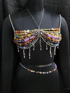 Details: - Includes : Bralette and Waist Chain Both - Materials: Natural Gemstones, Crystals & Alloy chain - Size: Please select the size appliable, and message for any clarification. - Customization: Available upon request - Shipping: Usually ships within 3-5 working days, with delivery in 8-15 days; If need earlier, please select expedited shipping at checkout and feel free to reach out to us for any clarification. Care Instructions: - Avoid contact with water and harsh chemicals - Store in a Beaded Bralette, Body Chain Fashion, Beaded Bra, Rave Concert, Bead Bra, Mermaid Top, Festival Rave Outfit, Festival Attire, Mermaid Core