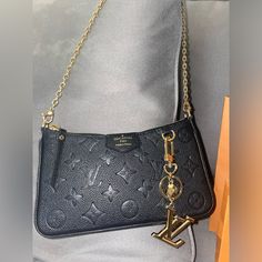 Easy Pouch On Strap Louis Vuitton Bag With Charm Lv Facettes Bag Black Monogram Canvas Pouch Shoulder Bag, Louis Vuitton Easy Pouch On Strap, Easy Pouch On Strap Lv, Black Louis Vuitton Bag, Lv Bag Charm, Purse Outfit, Mini Crossbody Purse, Louis Vuitton Purse, Bag Charms