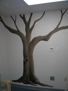 a tree painted on the wall in an office