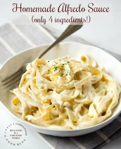 homemade alfredo sauce only 4 ingredients in a white bowl with a fork on the side