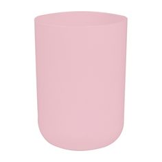 a pink vase sitting on top of a white table