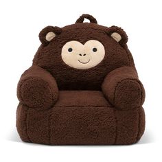 a brown chair with a monkey face on it's back and arms, sitting in front of a white background