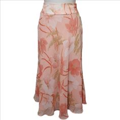 A Light And Airy Pastel Peach Midi Skirt With A Coral Floral Print. It Xips On The Side And Is Fully Lined. Transition Into Fall By Pairing With A Sweater. Size 6p 14½" Waist 29" Length 100% Silk Dry Clean Formal Summer Skirt With Floral Print, Chic Fitted Peach Skirt, Elegant Pink Floral Print Maxi Skirt, Summer Fitted Peach Skirt, Chic Peach Skirt For Spring, Fitted Peach Skirt For Summer, Spring Formal Maxi Skirt, Peach Lined Skirt For Spring, Pink Skirt For Spring Formal Occasions