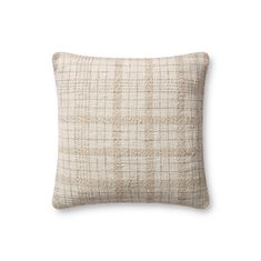 a beige and white pillow on a white background