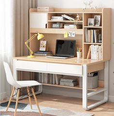 a computer desk with a laptop on it in front of a bookshelf and window