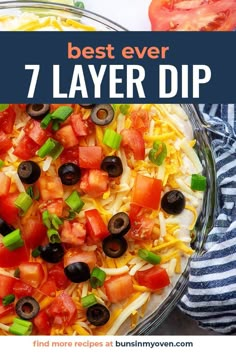 the best ever 7 layer dip recipe in a glass bowl