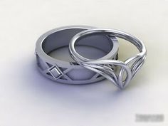 two wedding rings with intertwined designs on them, one is white gold and the other is silver