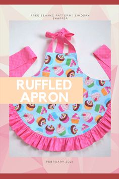 a blue apron with pink ruffles and cupcakes on it