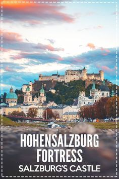 a castle on top of a hill with the words hohensalzburg fortress