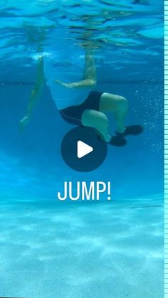 a person swimming under water with the words jump