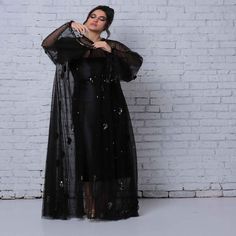 Soft tulle cape abaya designed with full length metal embroidery. Comes in another color (Black color) and can be purchased satin cocktail dress. -Soft Tulle.  -Dry clean only. -Handle with care. Metal Embroidery, Tulle Cape, Satin Cocktail Dress, Abaya Designs, Soft Tulle, Mens Jewelry Bracelet, Independent Designers Fashion, Tulle Dress, Fashion Labels