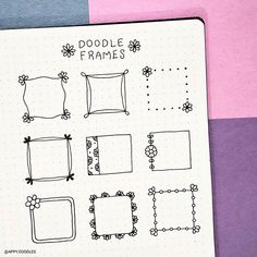 a notebook with doodle frames on it