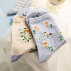 A set of 3 pairs of crew length socks featuring florals, birds, gingham plaid, embroidered rabbits, and frills. Cute Cotton Socks For Spring, Cute Cotton Socks For Fall, Cute Blue Spring Socks, Spring Cotton Socks Gift, Cotton Socks For Spring Gift, Spring Gift Cotton Socks, Comfortable Cotton Socks For Spring, Summer Cotton Socks For Gifts, Beige Cotton Socks For Summer