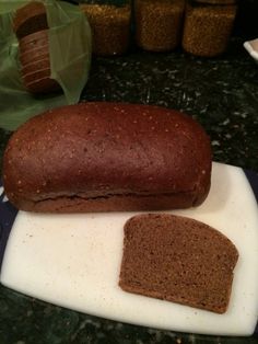 a loaf of bread sitting on top of a cutting board