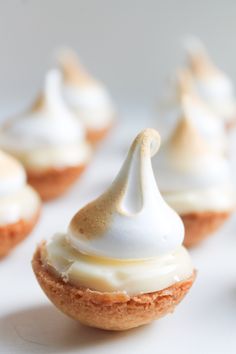 small cupcakes with white frosting on top