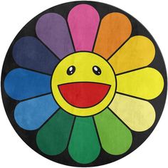 a rainbow colored flower with a smiley face on it's center and black background