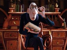 a cartoon character sitting in a chair holding a book