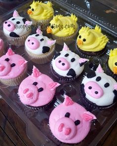 cupcakes in the shape of farm animals are decorated with pink frosting and yellow icing