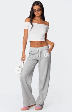 Reach your ultimate level of coziness while still feeling on-trend with these perfect 06 sweatpants from Edikted.SweatpantsStraight leg fitAdjustable tie waistEmbroidered patchCotton, PolyesterModel wears size SModel height is 5'8Item care: Machine wash at maximum 30C, do not bleach, do not tumble dry, iron at a maximum of 110C, do not dry clean. Edikted Womens 06 Sweatpants - Gray size XS Sweatpants Straight Leg, American Casual, Denim Sweater, Printed Wide Leg Pants, Grey Sweatpants, Swimwear Dress, Knitted Tops, Swimwear Cover Ups, Womens Loungewear