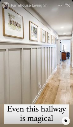 a hallway with white paneling and pictures on the wall, saying even this hallway is magic