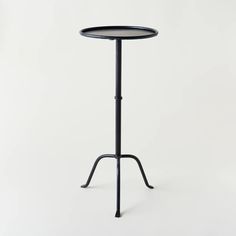 The Lexi Side Table will add a beautiful touch to any room! Its elegant, decorative legs and minimalist profile make it the perfect addition for large and small spaces alike. Set it against a wall or next to your favorite chair for a unique look.  Dimensions: 12.5"Dia. x 27.75"H Bar Game Room, Bar Games, Creative Co Op, Iron Table, Decor Essentials, Fixer Upper, Game Room, Small Spaces, Side Table