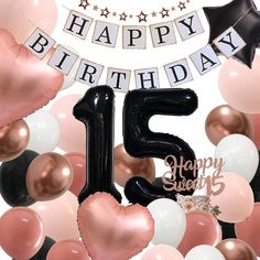 the number fifteen is surrounded by balloons and streamers in black, pink, and white