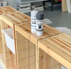 two wooden shelves with spray paint on them