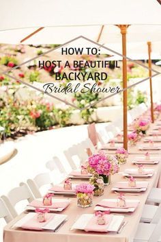 a table set up for a bridal shower with pink napkins and place settings