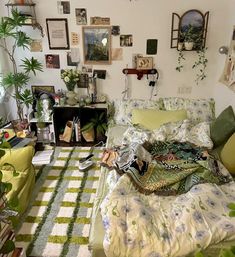 a bed room with a neatly made bed and lots of plants