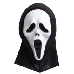 a white mask with black eyes and mouth is shown in front of a white background