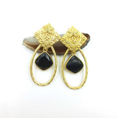 Antique Earrings, Black Onyx Gemstone Dangle Earrings, 18k Gold Plated Handmade Earrings, Vintage Earrings, Fancy Gift Earrings For Women -----------------------ITEM DESCRIPTION----------------------- Model No:- NALG038 Gemstone Name: Black Onyx  Gemstone Size: 12x12mm  Plating: 18k Gold Matt Finished  Quality: AAA+ HIGH QUALITY Note: Item's photo is closely captured to the item so please check dimensions before placing the order. -----------------------Love Talks----------------------- We love Elegant Onyx Earrings, Elegant Onyx Dangle Earrings, Formal Onyx Gemstone Earrings, Elegant Gemstone Metal Earrings, Gold Onyx Earrings For Evening, Black Gold-plated Pierced Earrings, Black Brass Hoop Earrings As Gift, Black Gold-plated Earrings, Single Black Brass Earring