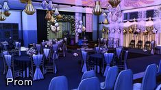 a room filled with tables and chairs covered in blue tablecloths next to chandeliers