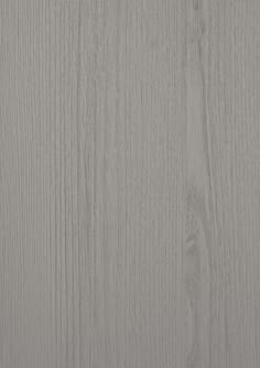 a close up view of the wood grains on a surface that looks like it has been painted gray