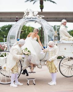 the bride and groom are being pulled in a horse drawn carriage by two other people