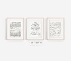 three framed music manuscripts on a wall with the words, but prints below them