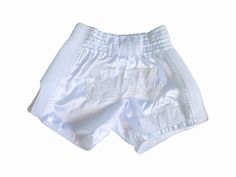 a pair of white shorts with the word love on it