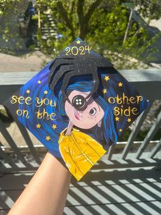 someone is holding up a graduation cap that says, see you on the other side