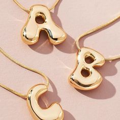 Dare to make a splash with our Waterdrop Initial Necklace! Crafted from 18K gold and beautifully filed, this necklace is perfect for those looking to add a luxurious touch to their outfit. With its unique waterdrop shape, this necklace is guaranteed to add excitement and adventure to your style. So go ahead, take the plunge and make a statement! Initial size is 0.75” 18” chain length with 2” extension Chunky Initial Necklace, Chunky Letter Necklace, Permanent Ring, 20th Bday, Jewlery Earrings, Dream Wishlist, Initial Necklace Silver, Bday Gifts, Bubble Letter