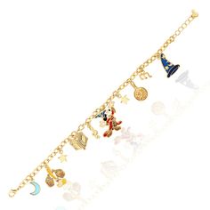 a gold bracelet with charms on it, including an image of mickey mouse and other items