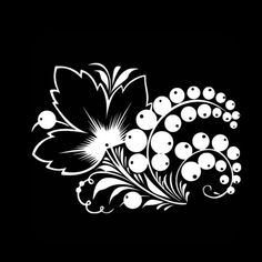 a black and white image of flowers on a black background