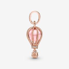 Reach new heights with the Sparkling Pink Hot Air Balloon Dangle Charm. This warm-toned charm is crafted from a 14k rose gold-plated unique metal blend. Beaded ropes encase a fairy tale pink crystal accented by shimmering clear cubic zirconia. The bail and base of the balloon are embellished with glittering pavé. Below, a small gondola awaits to transport you to your destination. Available in-store and online. | Pandora Sparkling Pink Hot Air Balloon Dangle Charm in 14k Rose gold-plated unique m Pink Hot Air Balloon, Charms Pandora, Bracelet Pandora, Beaded Rope, Pandora Style, Pandora Bracelet Charms, Pandora Silver, A Fairy Tale, Cute Charms