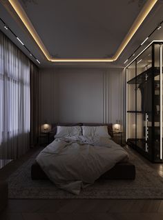 a large bed sitting in the middle of a bedroom next to a tall glass wall