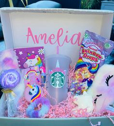 a box filled with stuffed animals and candy