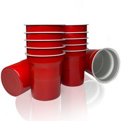 several red cups stacked on top of each other with one cup in front of them