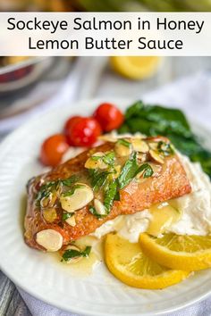 salmon with lemon butter sauce on a white plate