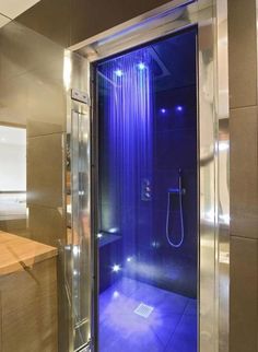 a shower with blue lights in it and the caption says, like if you want this shower