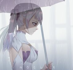 a woman holding an umbrella in the rain